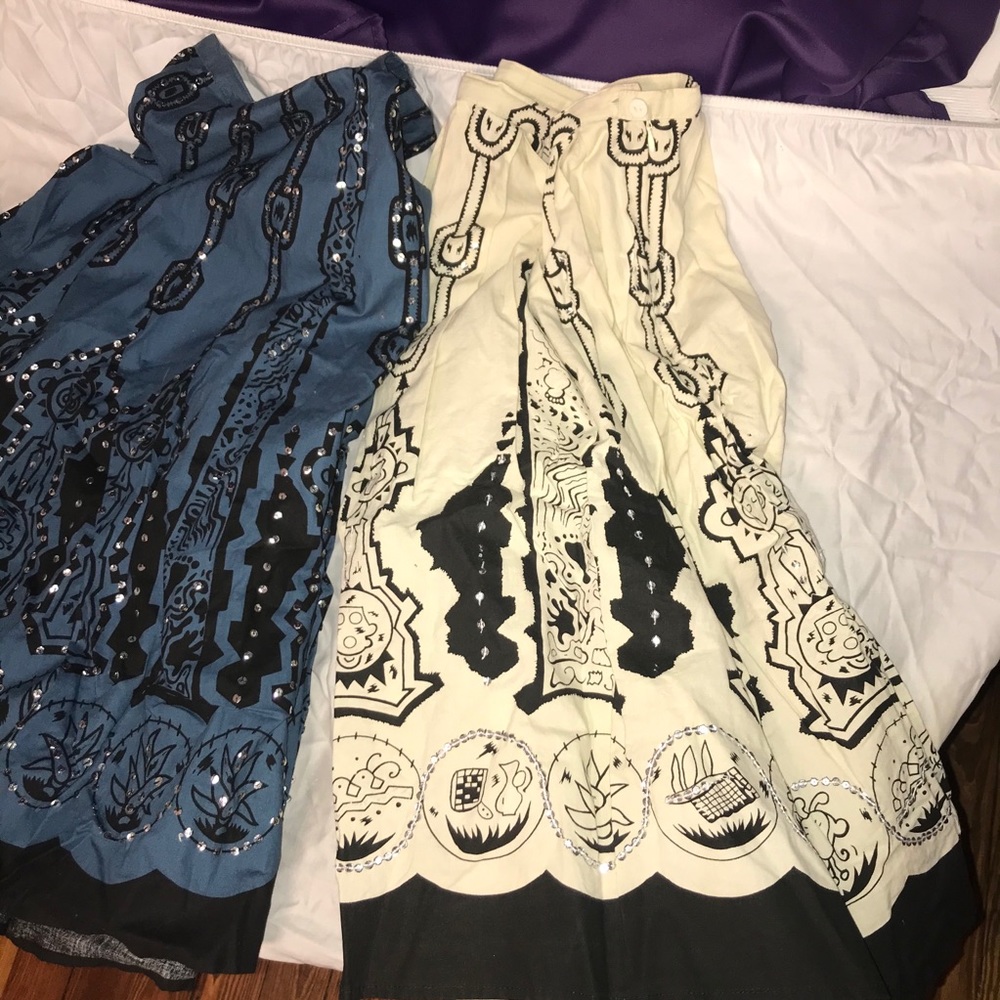Two sequin skirts.